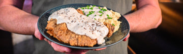 Chicken Fried Venison with Garlic Smashed Potatoes and Cracked Pepper Gravy