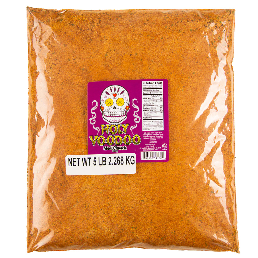 Alt text: "A 5-pound bulk bag of 'Holy Voodoo' seasoning by Meat Church, featuring a brightly colored label with a skull design and nutritional facts visible on the front, set against a textured spice content background."